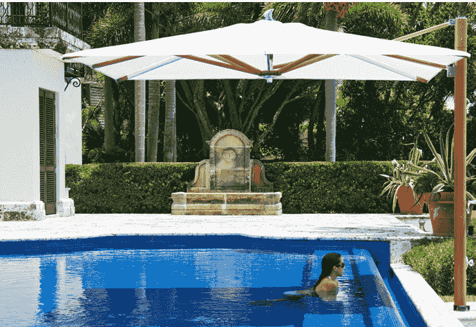 Cantilever umbrella by a resort pool