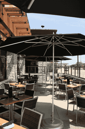 Standard umbrella in outdoor seating setting